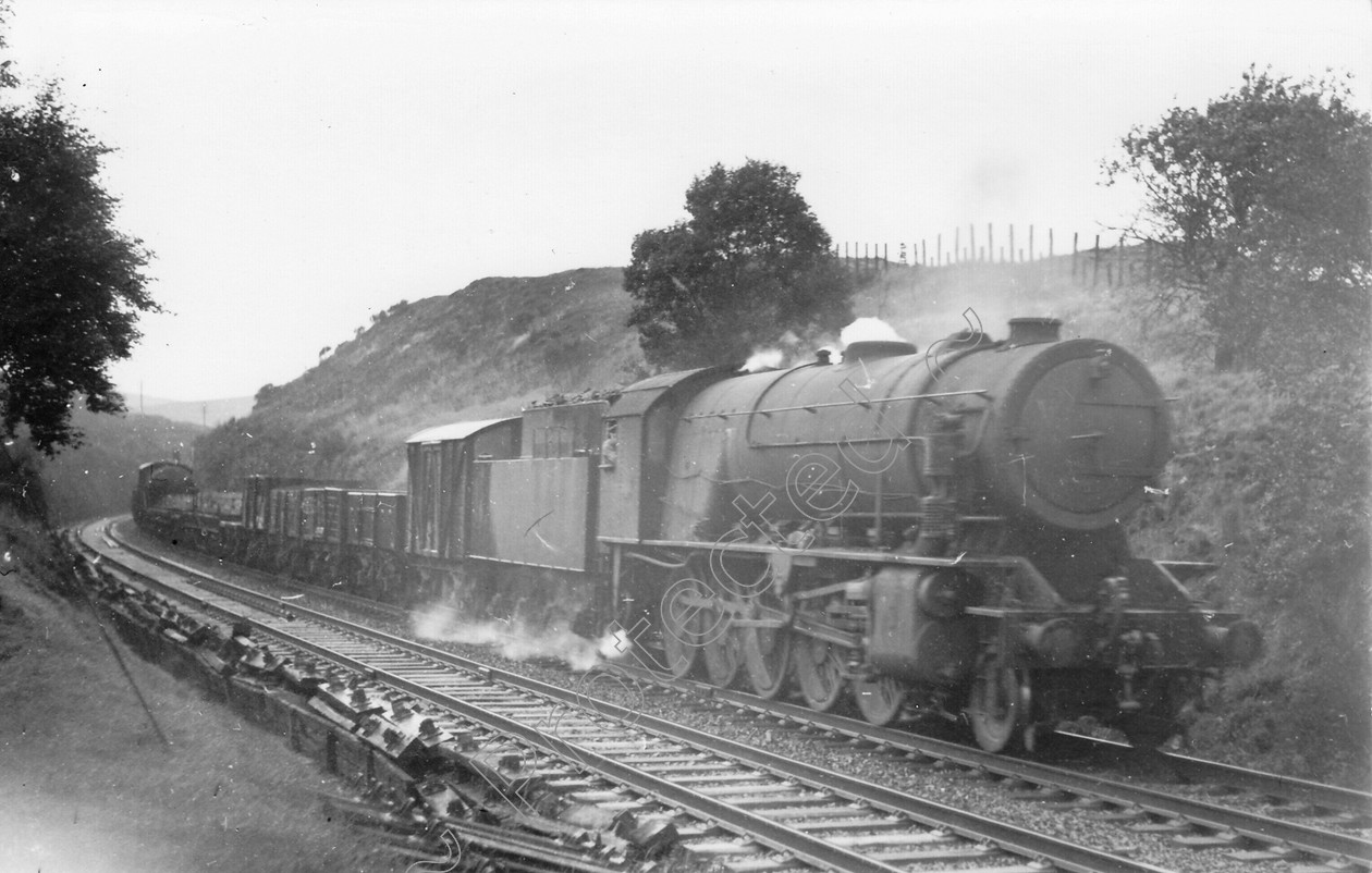 WD2537 
 ENGINE CLASS: Riddles 2-8-0 90000 ENGINE NUMBER: 90??? LOCATION: Beattock DATE: 11 May 1950 COMMENTS: summit 
 Keywords: 11 May 1950, 90???, Beattock, Cooperline, Riddles 2-8-0 90000, Steam, WD Cooper, locomotives, railway photography, summit, trains