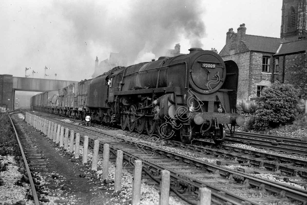 WD2607 
 ENGINE CLASS: BR Class 9 ENGINE NUMBER: 92009 LOCATION: Eccles DATE: 12 August 1964 COMMENTS: 
 Keywords: 12 August 1964, 92009, BR Class 9, Cooperline, Eccles, Steam, WD Cooper, locomotives, railway photography, trains