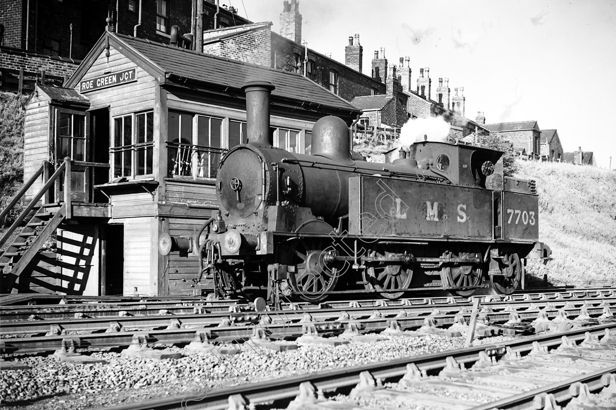 WD0935 
 ENGINE CLASS: L.N.W.R. ENGINE NUMBER: 7703 LOCATION: Roe Green DATE: COMMENTS: 
 Keywords: 7703, Cooperline, L.N.W.R., Roe Green, Steam, WD Cooper, locomotives, railway photography, trains