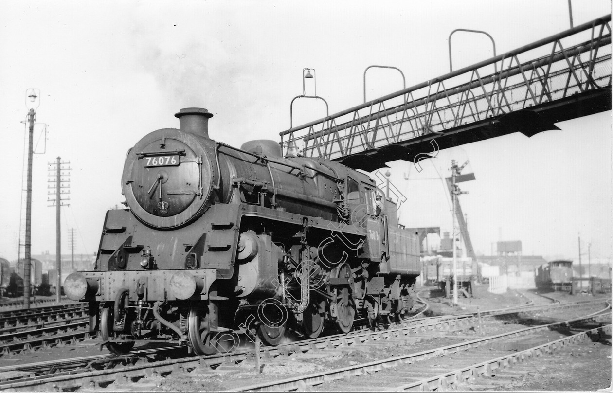 WD0694 
 ENGINE CLASS: Moguls 2-6-0 ENGINE NUMBER: 76076 LOCATION: Patricroft DATE: 03 March 1958 COMMENTS: 
 Keywords: 03 March 1958, 76076, Cooperline, Moguls 2-6-0, Patricroft, Steam, WD Cooper, locomotives, railway photography, trains