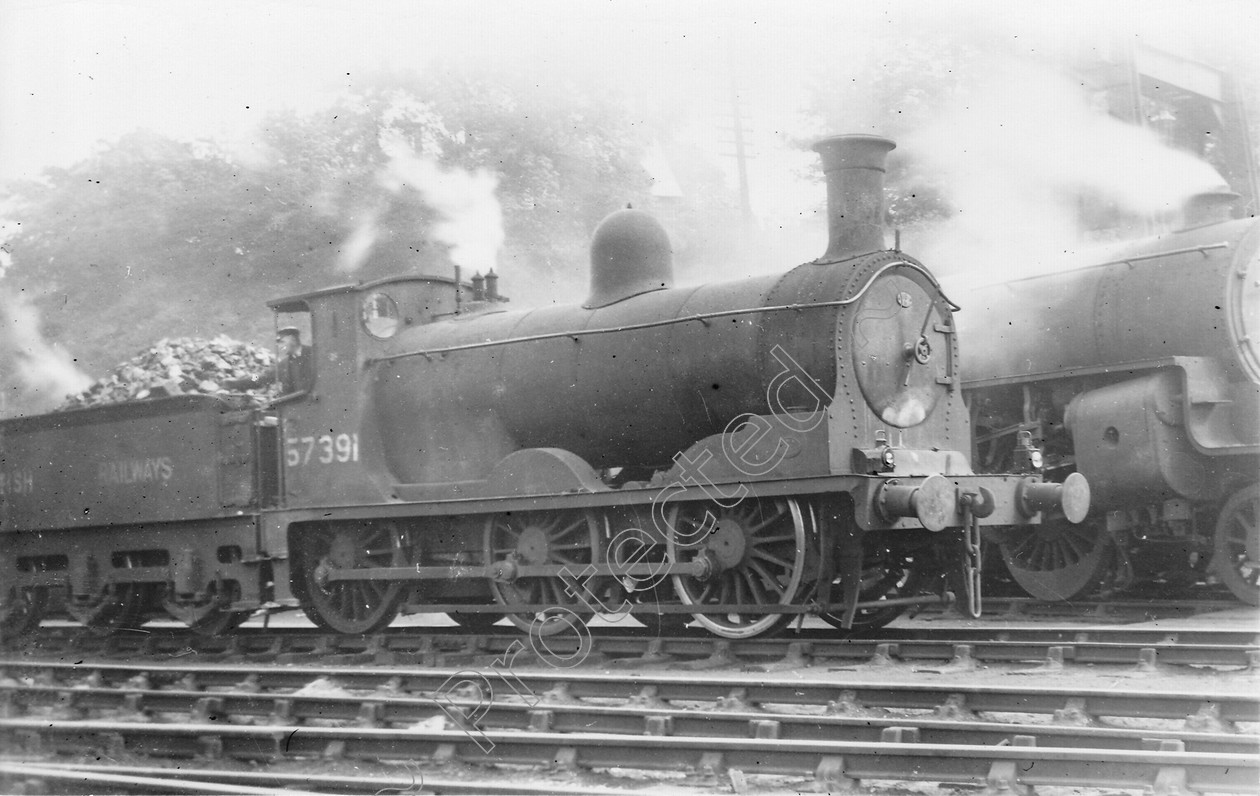 WD0794 
 ENGINE CLASS: Scottish ENGINE NUMBER: 57391 LOCATION: Dumfries DATE: 09 August 1950 COMMENTS: 
 Keywords: 09 August 1950, 57391, Cooperline, Dumfries, Scottish, Steam, WD Cooper, locomotives, railway photography, trains