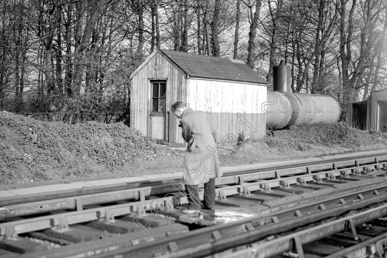 WD2872 
 ENGINE CLASS: Points of Interest ENGINE NUMBER: LOCATION: DATE: COMMENTS: Ganger at work 
 Keywords: Cooperline, Ganger at work, Points of Interest, Steam, WD Cooper, locomotives, railway photography, trains