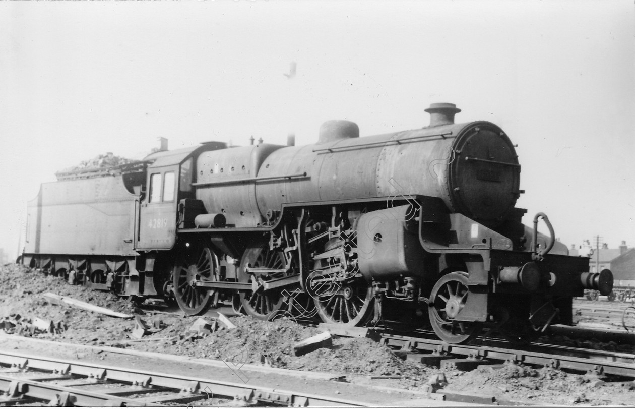 WD0641 
 ENGINE CLASS: Moguls 2-6-0 ENGINE NUMBER: 42819 LOCATION: Patricroft DATE: 08 March 1965 COMMENTS: 
 Keywords: 08 March 1965, 42819, Cooperline, Moguls 2-6-0, Patricroft, Steam, WD Cooper, locomotives, railway photography, trains