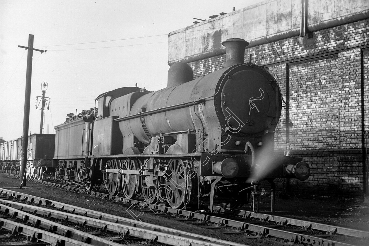 WD0971 
 ENGINE CLASS: L.N.W.R. ENGINE NUMBER: 49323 LOCATION: Patricroft DATE: 12 December 1962 COMMENTS: 
 Keywords: 12 December 1962, 49323, Cooperline, L.N.W.R., Patricroft, Steam, WD Cooper, locomotives, railway photography, trains