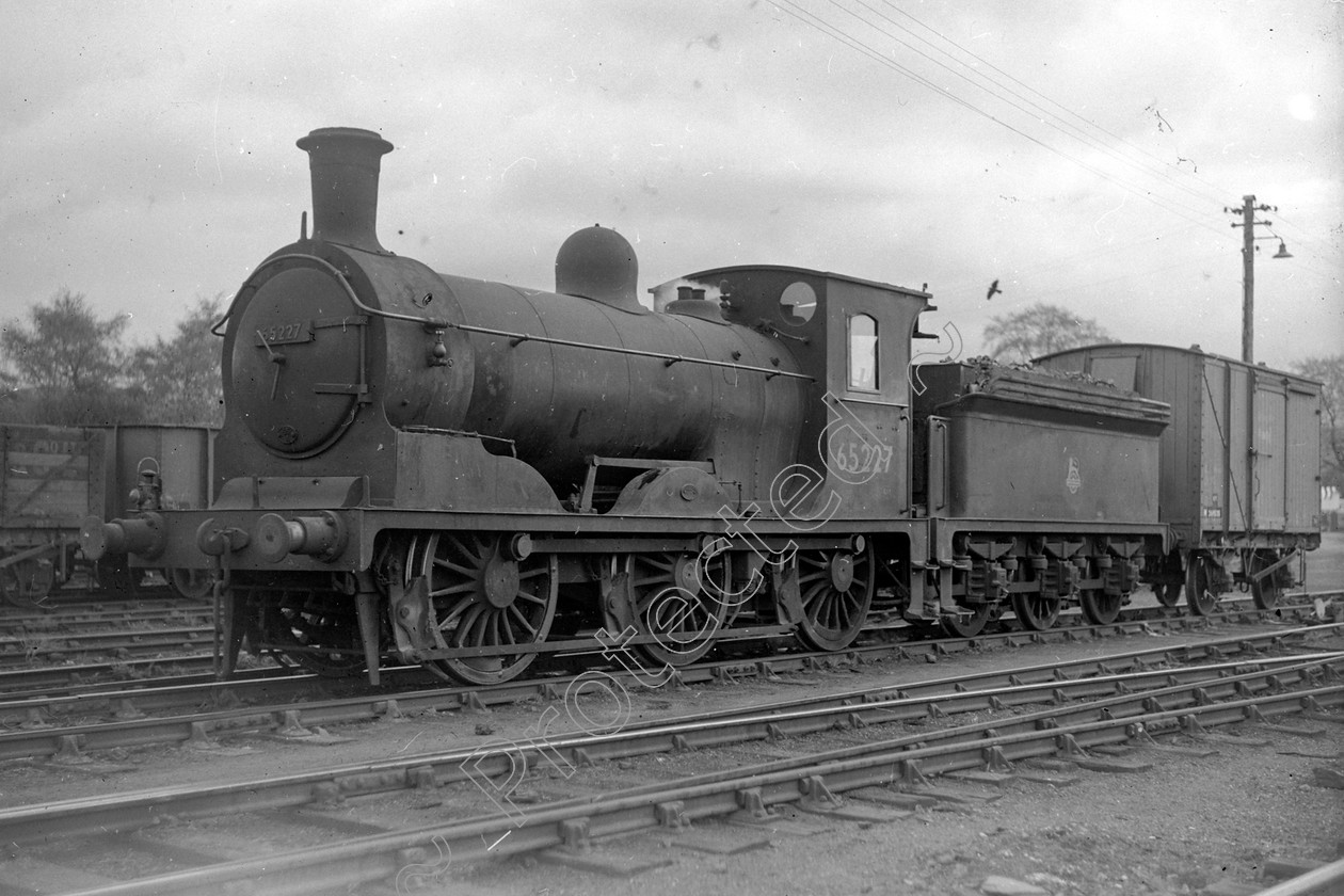 WD2737 
 ENGINE CLASS: L.N.E.R. ENGINE NUMBER: 65227 LOCATION: Ballock DATE: 15 May 1951 COMMENTS: 
 Keywords: 15 May 1951, 65227, Ballock, Cooperline, L.N.E.R., Steam, WD Cooper, locomotives, railway photography, trains