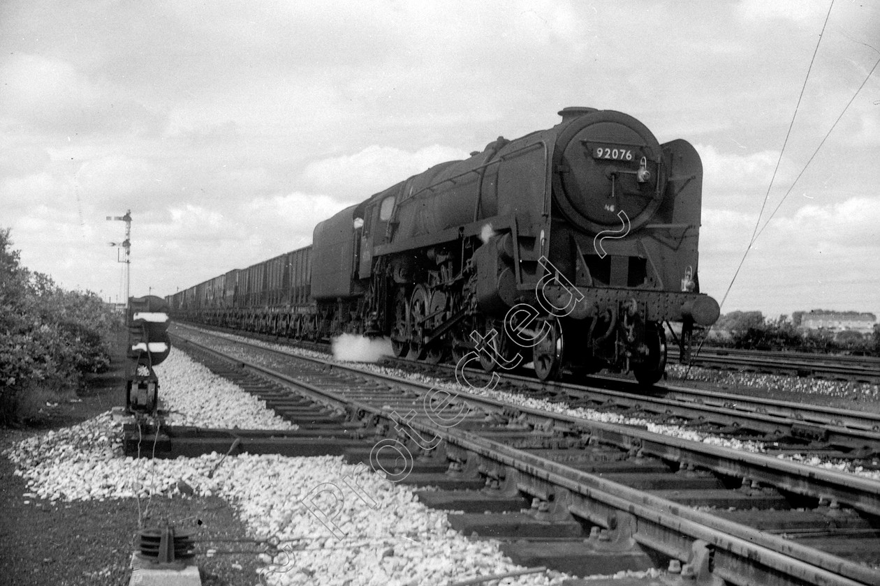 WD2640 
 ENGINE CLASS: BR Class 9 ENGINE NUMBER: 92076 LOCATION: Standish DATE: 03 August 1965 COMMENTS: 
 Keywords: 03 August 1965, 92076, BR Class 9, Cooperline, Standish, Steam, WD Cooper, locomotives, railway photography, trains