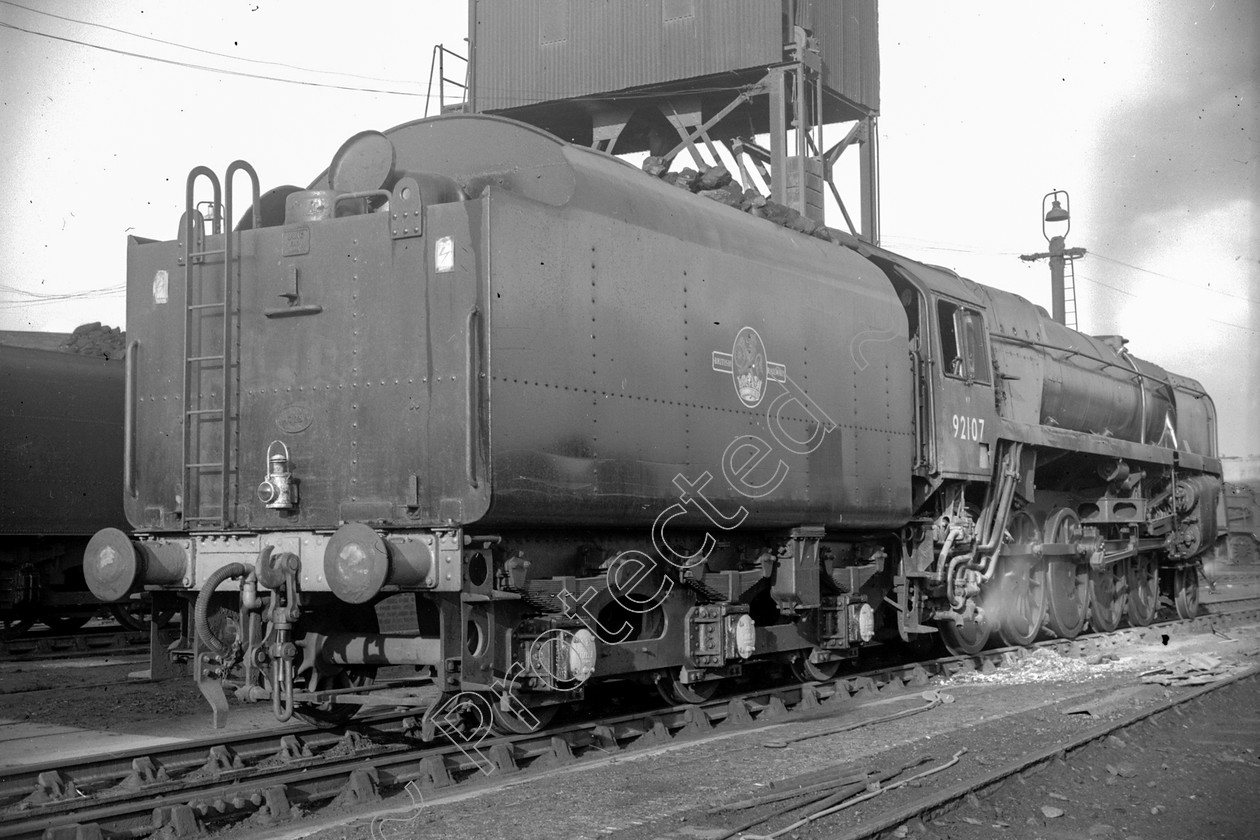 WD2652 
 ENGINE CLASS: BR Class 9 ENGINE NUMBER: 92107 LOCATION: Patricroft DATE: 24 March 1965 COMMENTS: 
 Keywords: 24 March 1965, 92107, BR Class 9, Cooperline, Patricroft, Steam, WD Cooper, locomotives, railway photography, trains