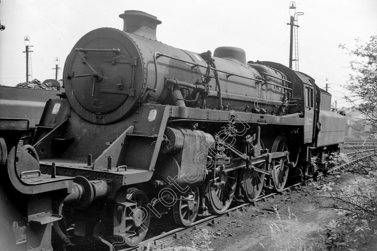 WD2480 
 ENGINE CLASS: BR 75000 4-6-0 ENGINE NUMBER: 75020 LOCATION: Carnforth DATE: 27 June 1967 COMMENTS: 
 Keywords: 27 June 1967, 75020, BR 75000 4-6-0, Carnforth, Cooperline, Steam, WD Cooper, locomotives, railway photography, trains