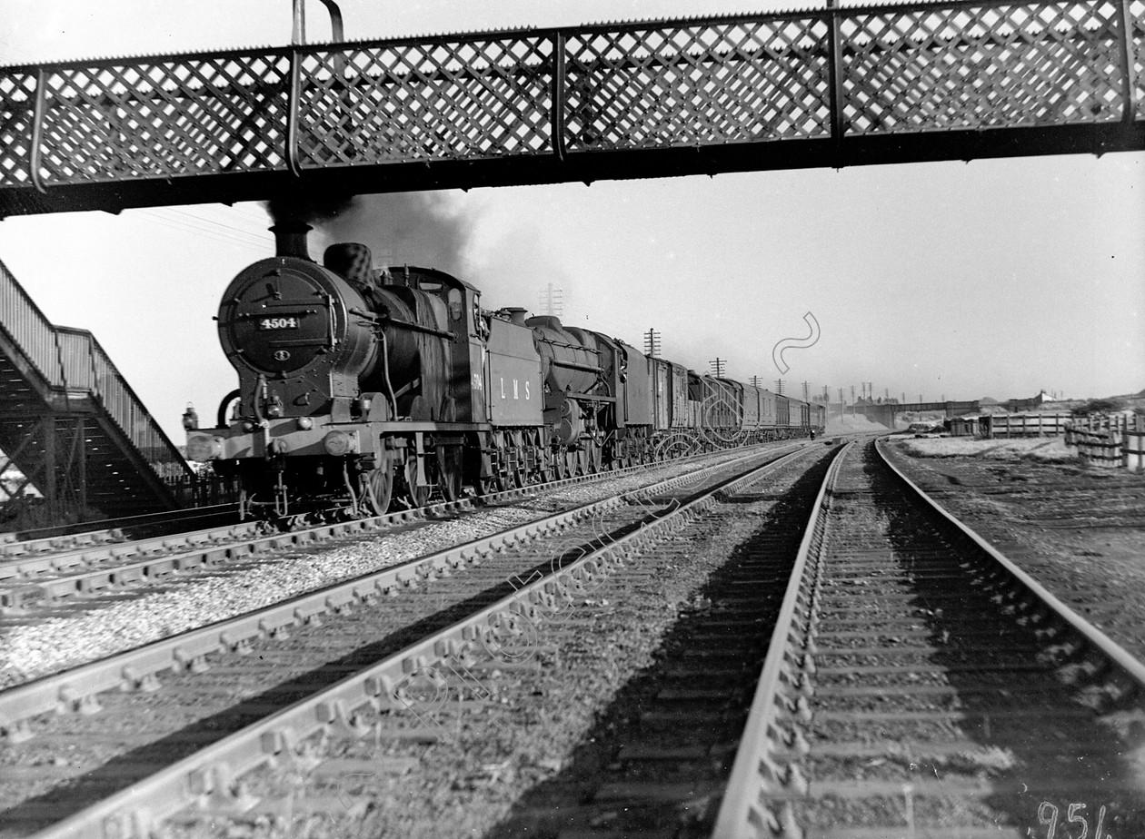 WDDH0954 
 ENGINE CLASS: Double Headed ENGINE NUMBER: 5044, 4504 LOCATION: Golborne DATE: 10 September 1945 COMMENTS: 
 Keywords: 10 September 1945, 4504, 5044, Cooperline, Double Headed, Golborne, Steam, WD Cooper, locomotives, railway photography, trains