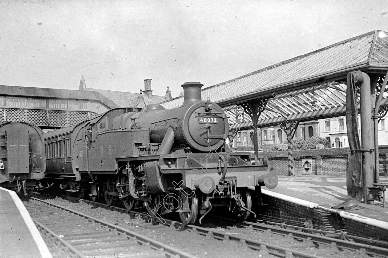 WD0583 
 ENGINE CLASS: 2-6-2 Tanks Stanier and Ivatt ENGINE NUMBER: 40073 LOCATION: Caenarvon DATE: 00.05.1950 COMMENTS: 
 Keywords: 00.05.1950, 2-6-2 Tanks Stanier and Ivatt, 40073, Caenarvon, Cooperline, Steam, WD Cooper, locomotives, railway photography, trains