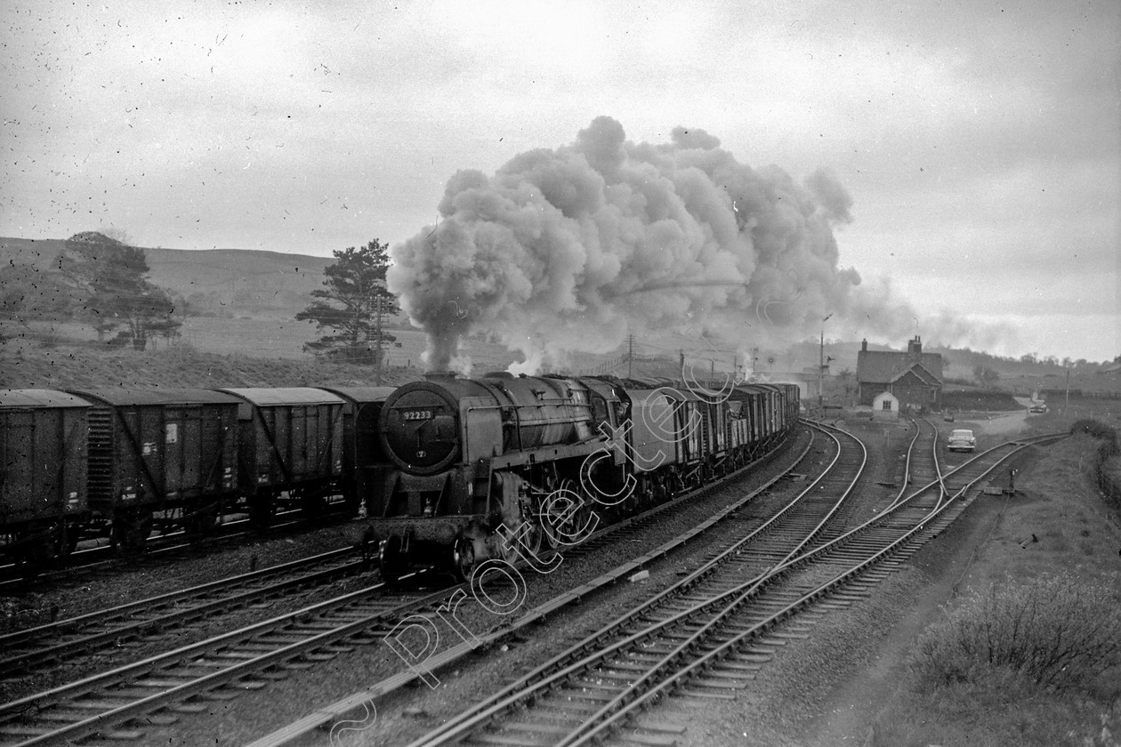 WD2683 
 ENGINE CLASS: BR Class 9 ENGINE NUMBER: 92233 LOCATION: Grayrigg DATE: 17 May 1966 COMMENTS: 
 Keywords: 17 May 1966, 92233, BR Class 9, Cooperline, Grayrigg, Steam, WD Cooper, locomotives, railway photography, trains