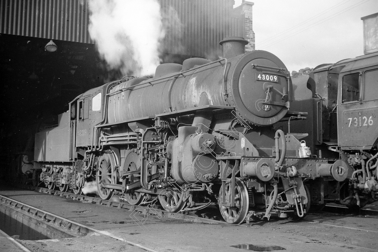 WD0885 
 ENGINE CLASS: Ivatt 6400 & 3000 ENGINE NUMBER: 43009 LOCATION: Patricroft DATE: 07 May 1964 COMMENTS: 
 Keywords: 07 May 1964, 43009, Cooperline, Ivatt 6400 & 3000, Patricroft, Steam, WD Cooper, locomotives, railway photography, trains