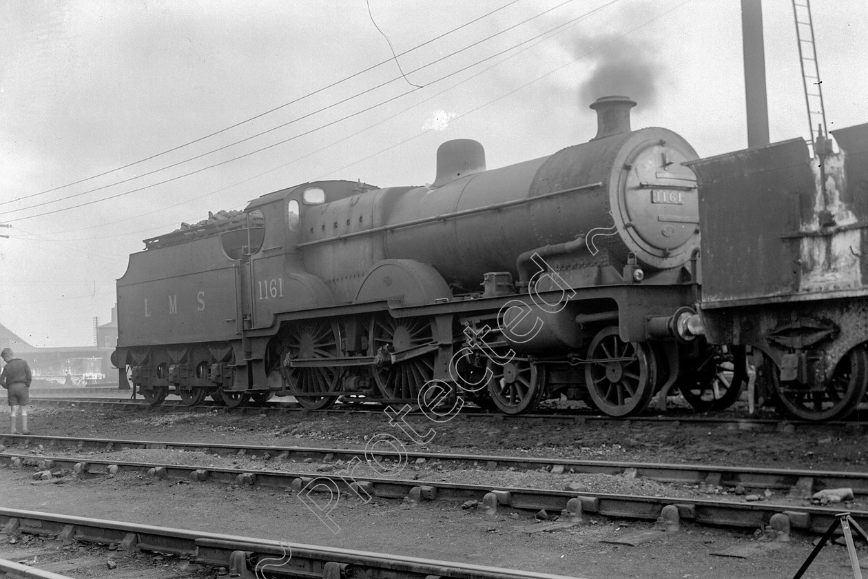 WD0502 
 ENGINE CLASS: Midland Compounds ENGINE NUMBER: 1162 LOCATION: Patricroft DATE: 22 August 1946 COMMENTS: 
 Keywords: 1162, 22 August 1946, Cooperline, Midland Compounds, Patricroft, Steam, WD Cooper, locomotives, railway photography, trains