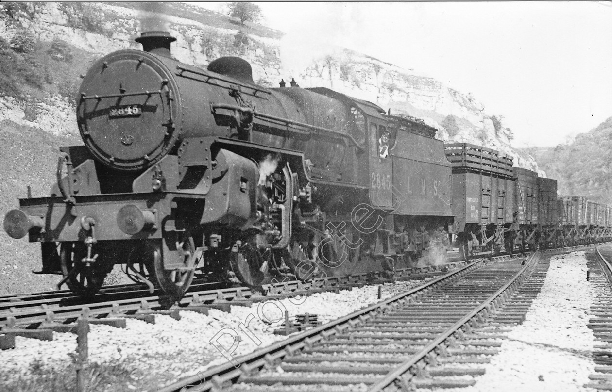 WD0648 
 ENGINE CLASS: Moguls 2-6-0 ENGINE NUMBER: 2845 LOCATION: Cheedale DATE: 00.05.1948 COMMENTS: 
 Keywords: 00.05.1948, 2845, Cheedale, Cooperline, Moguls 2-6-0, Steam, WD Cooper, locomotives, railway photography, trains