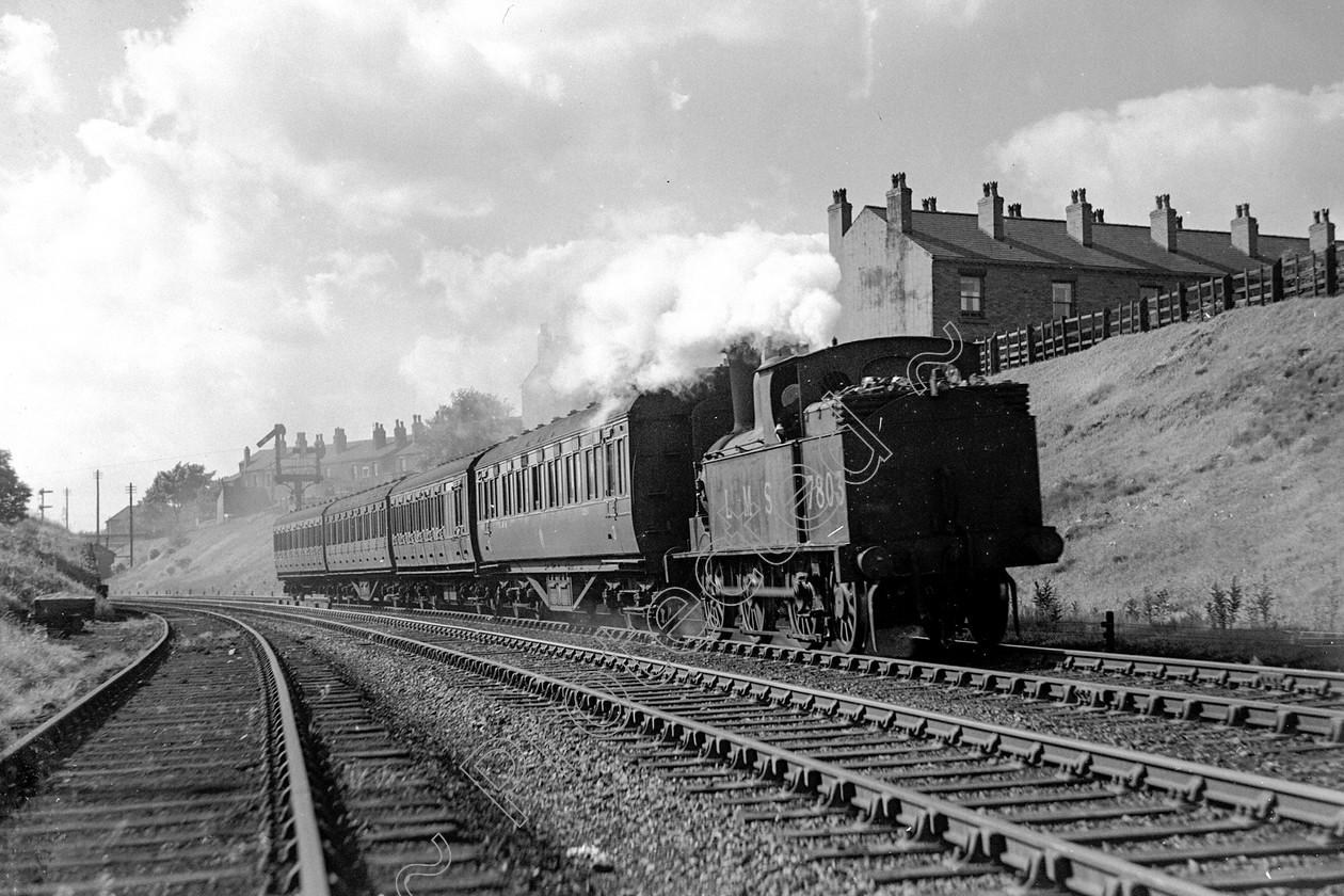 WD0929 
 ENGINE CLASS: L.N.W.R. ENGINE NUMBER: 7803 LOCATION: Roe Green DATE: 10 June 1949 COMMENTS: 
 Keywords: 10 June 1949, 7803, Cooperline, L.N.W.R., Roe Green, Steam, WD Cooper, locomotives, railway photography, trains