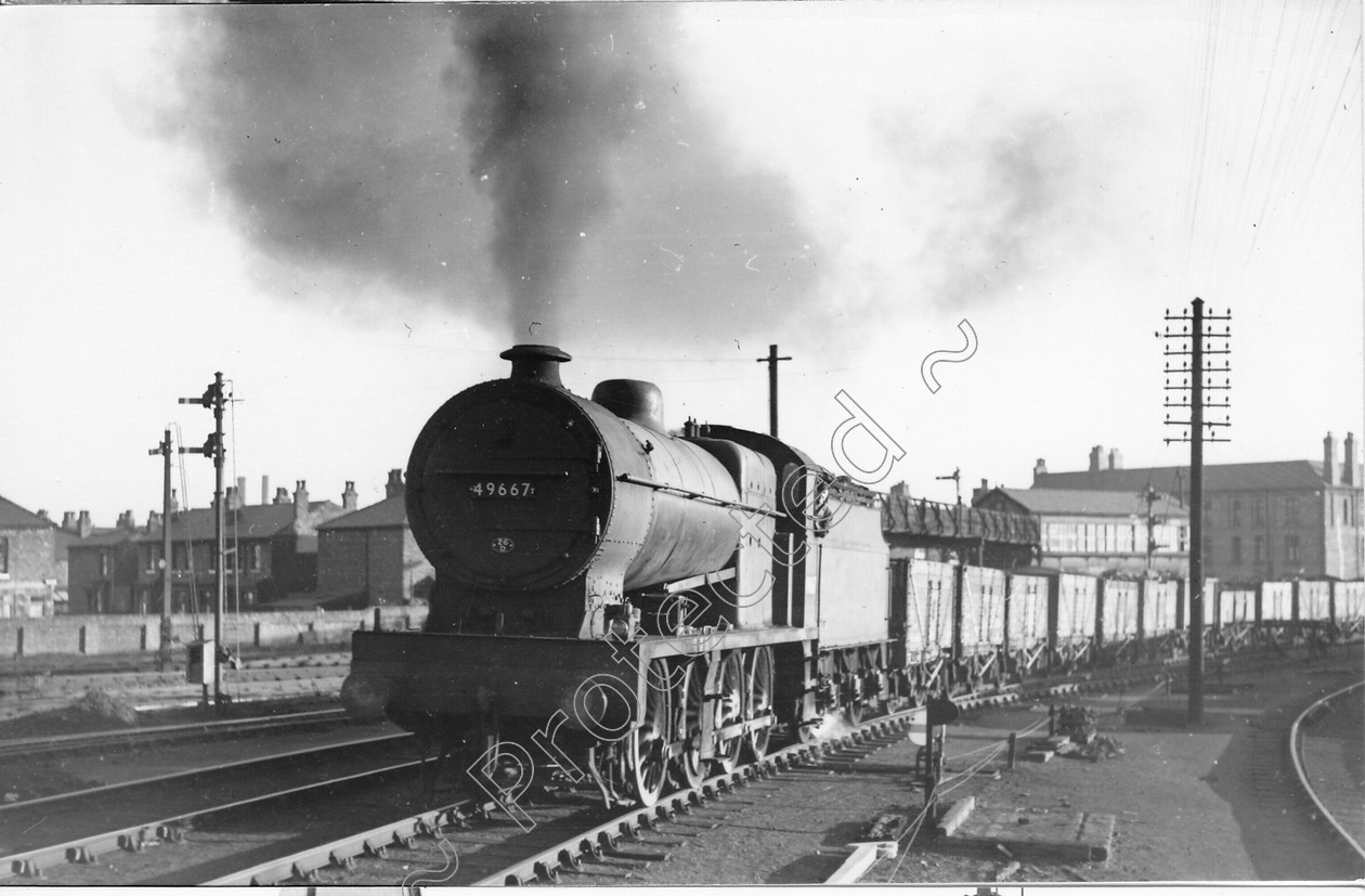 WD0773 
 ENGINE CLASS: Fowler 0-8-0 ENGINE NUMBER: 49667 LOCATION: Patricroft DATE: 00.05.1952 COMMENTS: 
 Keywords: 00.05.1952, 49667, Cooperline, Fowler 0-8-0, Patricroft, Steam, WD Cooper, locomotives, railway photography, trains