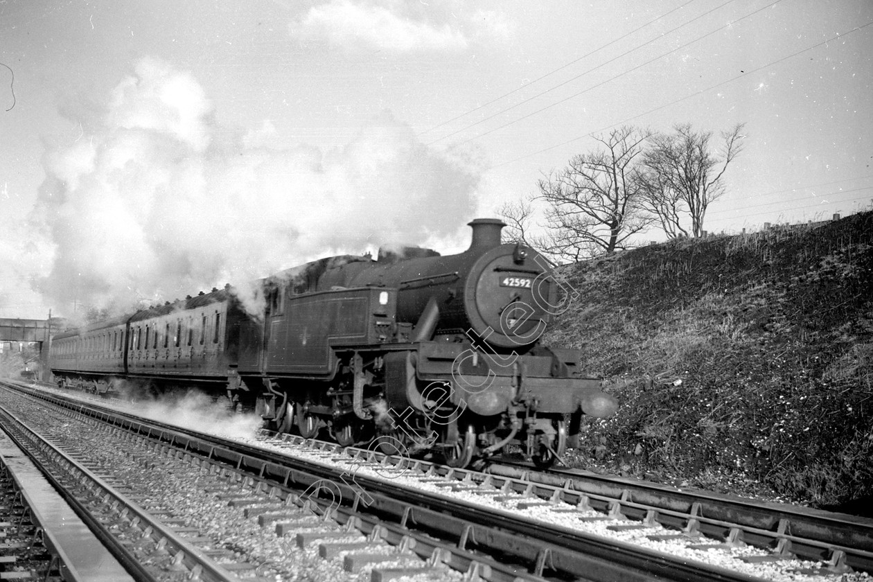 WD1073 
 ENGINE CLASS: 2-6-4 Tanks ENGINE NUMBER: 42592 LOCATION: Walkden Troughs DATE: 09 April 1962 COMMENTS: 
 Keywords: 09 April 1962, 2-6-4 Tanks, 42592, Cooperline, Steam, WD Cooper, Walkden Troughs, locomotives, railway photography, trains