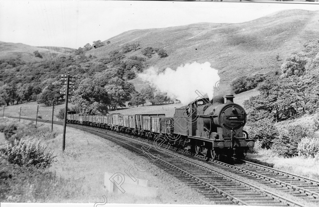 WD0715 
 ENGINE CLASS: Class 4 0-6-0 ENGINE NUMBER: 44189 LOCATION: Dalpedder with valley DATE: 10 August 1950 COMMENTS: 
 Keywords: 10 August 1950, 44189, Class 4 0-6-0, Cooperline, Dalpedder with valley, Steam, WD Cooper, locomotives, railway photography, trains