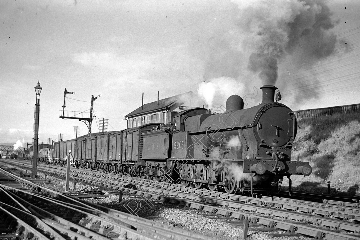 WD0904 
 ENGINE CLASS: L.N.W.R. ENGINE NUMBER: 9203 LOCATION: Carnforth DATE: 00.05.1949 COMMENTS: 
 Keywords: 00.05.1949, 9203, Carnforth, Cooperline, L.N.W.R., Steam, WD Cooper, locomotives, railway photography, trains