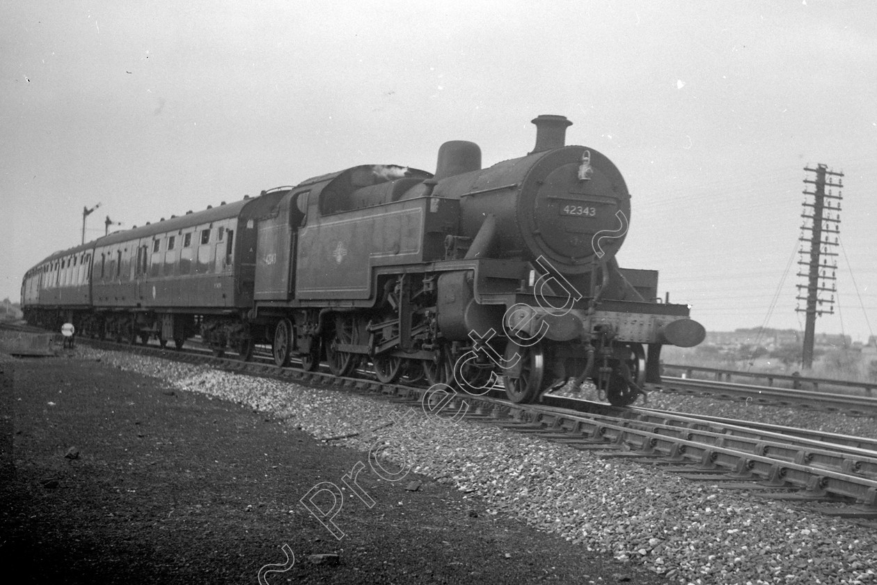 WD1035 
 ENGINE CLASS: 2-6-4 Tanks ENGINE NUMBER: 42343 LOCATION: Standish DATE: 12 July 1965 COMMENTS: 
 Keywords: 12 July 1965, 2-6-4 Tanks, 42343, Cooperline, Standish, Steam, WD Cooper, locomotives, railway photography, trains