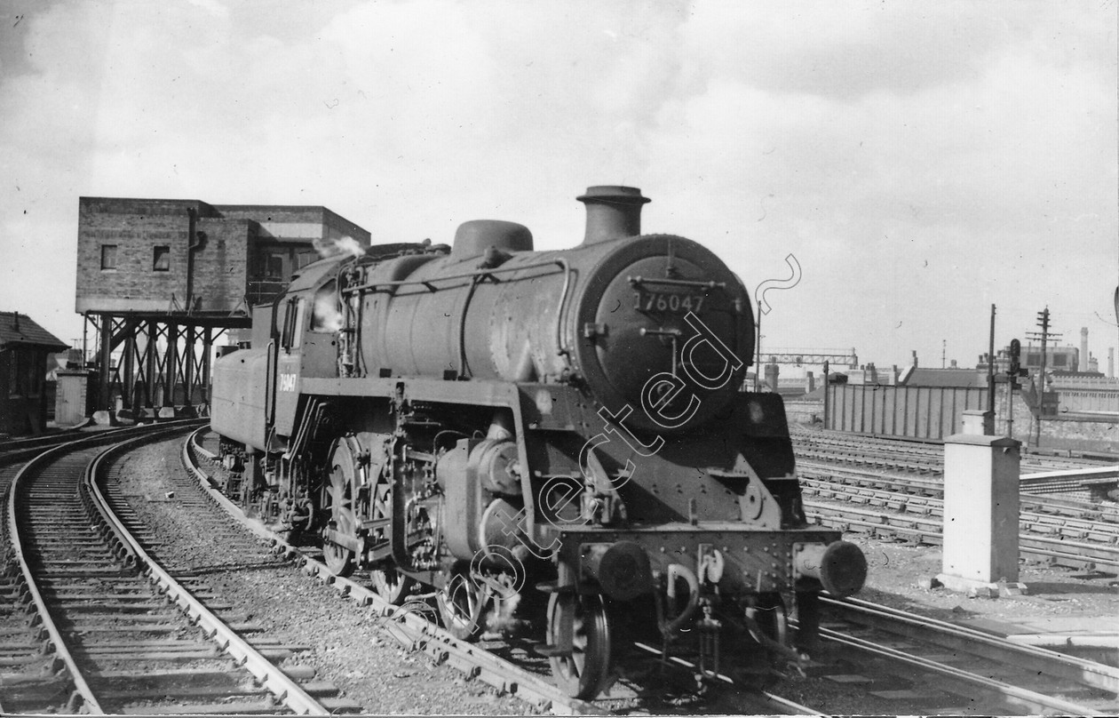 WD0691 
 ENGINE CLASS: Moguls 2-6-0 ENGINE NUMBER: 76047 LOCATION: Central Station DATE: 30 March 1962 COMMENTS: 
 Keywords: 30 March 1962, 76047, Central Station, Cooperline, Moguls 2-6-0, Steam, WD Cooper, locomotives, railway photography, trains