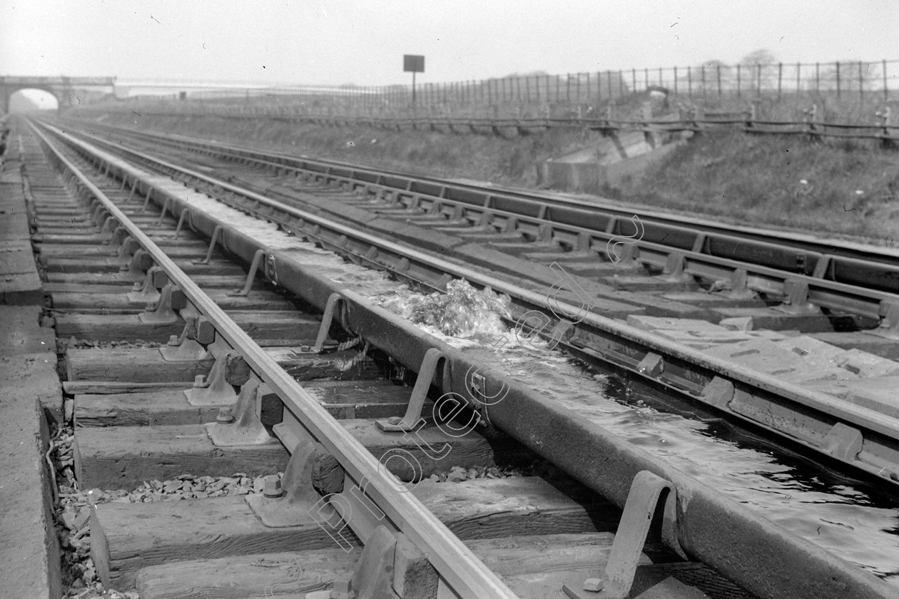 WD2874 
 ENGINE CLASS: Points of Interest ENGINE NUMBER: LOCATION: DATE: 01 September 1962 COMMENTS: Water filling 
 Keywords: 01 September 1962, Cooperline, Points of Interest, Steam, WD Cooper, Water filling, locomotives, railway photography, trains