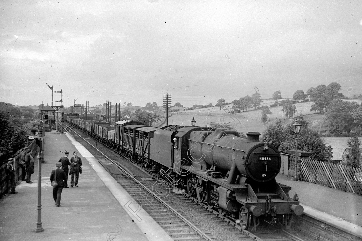 WD2049 
 ENGINE CLASS: Stanier Class 8 2-8-0 ENGINE NUMBER: 48454 LOCATION: Appleby DATE: 12 August 1950 COMMENTS: Station 
 Keywords: 12 August 1950, 48454, Appleby, Cooperline, Stanier Class 8 2-8-0, Station, Steam, WD Cooper, locomotives, railway photography, trains