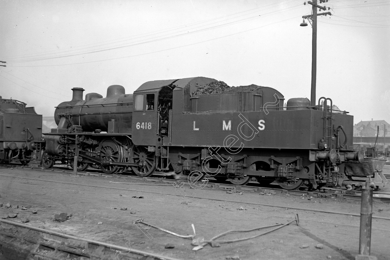 WD0870 
 ENGINE CLASS: Ivatt 6400 & 3000 ENGINE NUMBER: 6418 LOCATION: Newton Heath DATE: 12 May 1949 COMMENTS: 
 Keywords: 12 May 1949, 6418, Cooperline, Ivatt 6400 & 3000, Newton Heath, Steam, WD Cooper, locomotives, railway photography, trains