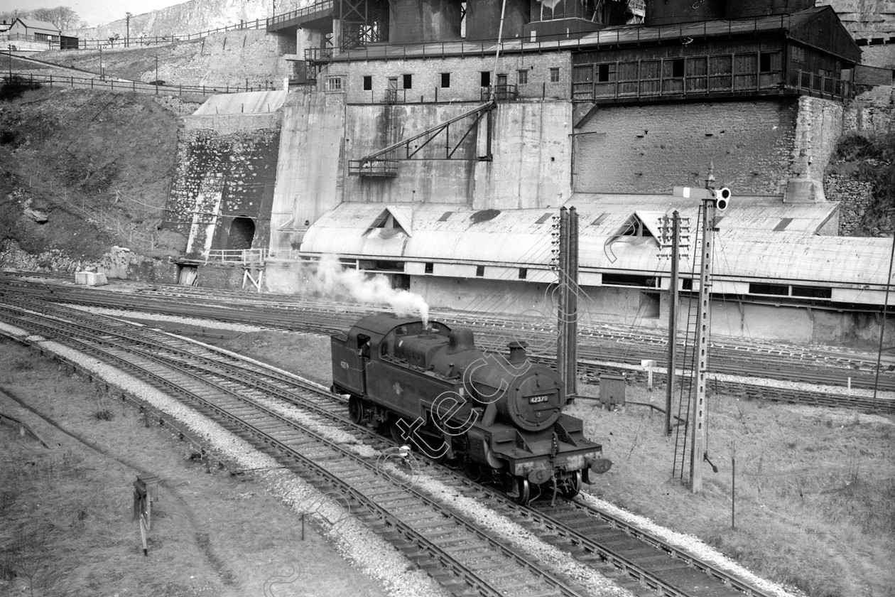 WD1042 
 ENGINE CLASS: 2-6-4 Tanks ENGINE NUMBER: 42379 LOCATION: Cheedale DATE: 23 March 1963 COMMENTS: 
 Keywords: 2-6-4 Tanks, 23 March 1963, 42379, Cheedale, Cooperline, Steam, WD Cooper, locomotives, railway photography, trains