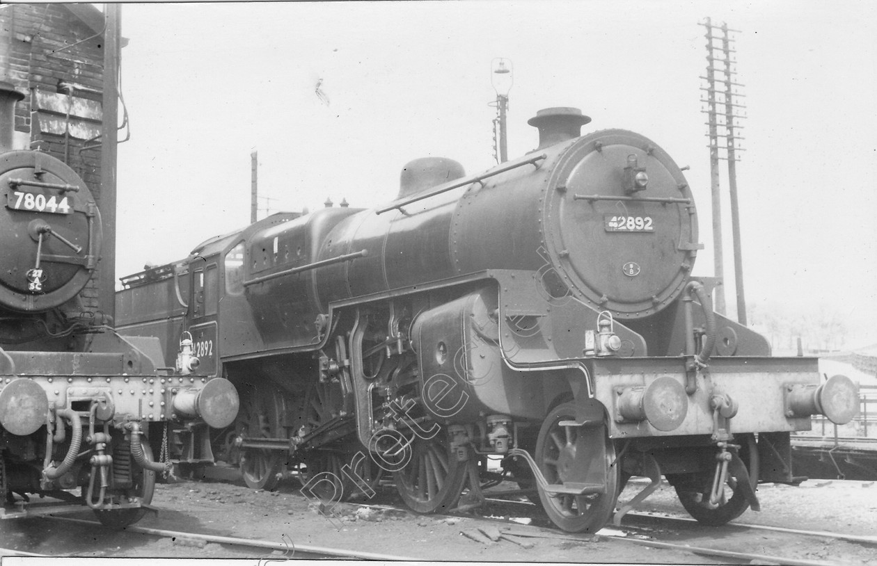 WD0659 
 ENGINE CLASS: Moguls 2-6-0 ENGINE NUMBER: 42892 LOCATION: Hellifield DATE: 12 May 1961 COMMENTS: 
 Keywords: 12 May 1961, 42892, Cooperline, Hellifield, Moguls 2-6-0, Steam, WD Cooper, locomotives, railway photography, trains