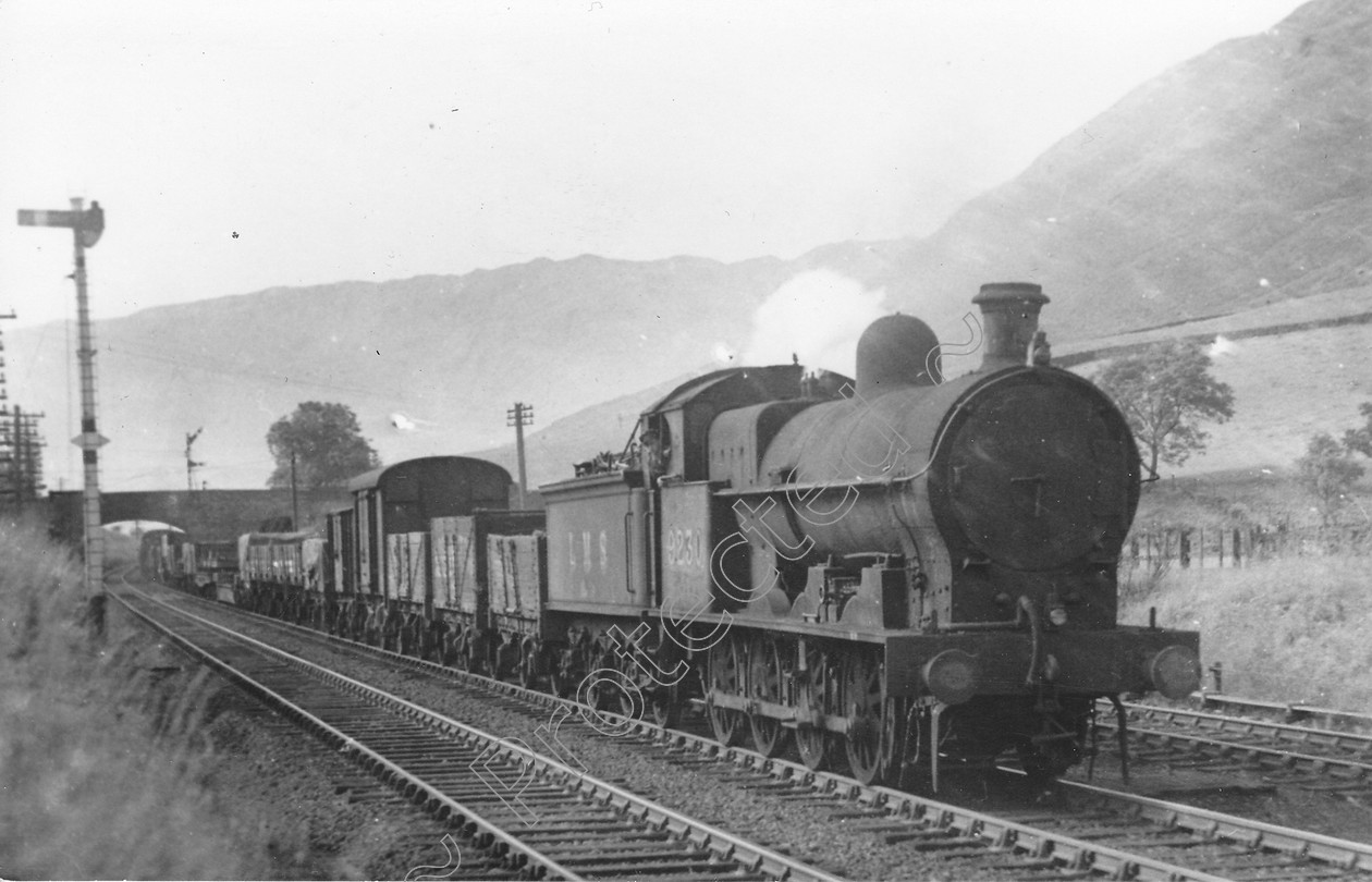 WD0947 
 ENGINE CLASS: L.N.W.R. ENGINE NUMBER: 9230 LOCATION: Tebay DATE: 03 July 1947 COMMENTS: 
 Keywords: 03 July 1947, 9230, Cooperline, L.N.W.R., Steam, Tebay, WD Cooper, locomotives, railway photography, trains