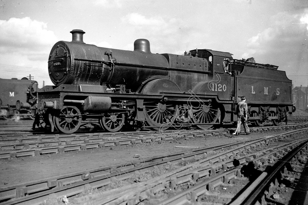 WD0511 
 ENGINE CLASS: Midland Compounds ENGINE NUMBER: 41120 LOCATION: Patricroft DATE: 20 March 1948 COMMENTS: 
 Keywords: 20 March 1948, 41120, Cooperline, Midland Compounds, Patricroft, Steam, WD Cooper, locomotives, railway photography, trains