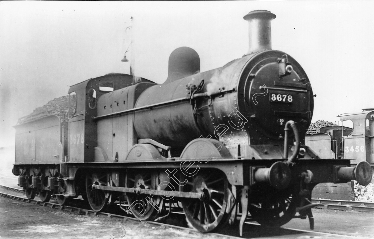 WD0718 
 ENGINE CLASS: Class 4 0-6-0 ENGINE NUMBER: 3678 LOCATION: Carnforth DATE: 00.05.1949 COMMENTS: 
 Keywords: 00.05.1949, 3678, Carnforth, Class 4 0-6-0, Cooperline, Steam, WD Cooper, locomotives, railway photography, trains