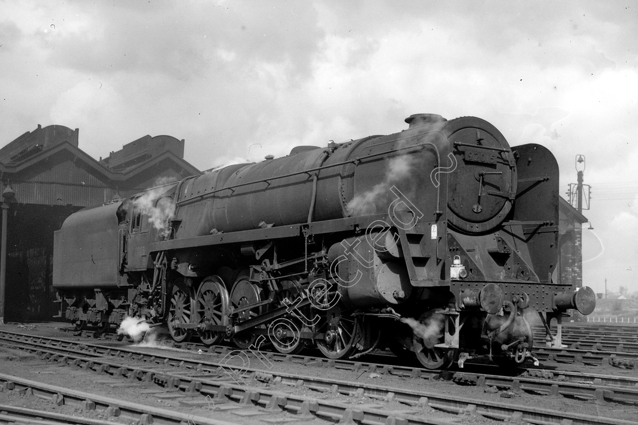 WD2613 
 ENGINE CLASS: BR Class 9 ENGINE NUMBER: 92015 LOCATION: Patricroft DATE: 01 June 1963 COMMENTS: 
 Keywords: 01 June 1963, 92015, BR Class 9, Cooperline, Patricroft, Steam, WD Cooper, locomotives, railway photography, trains