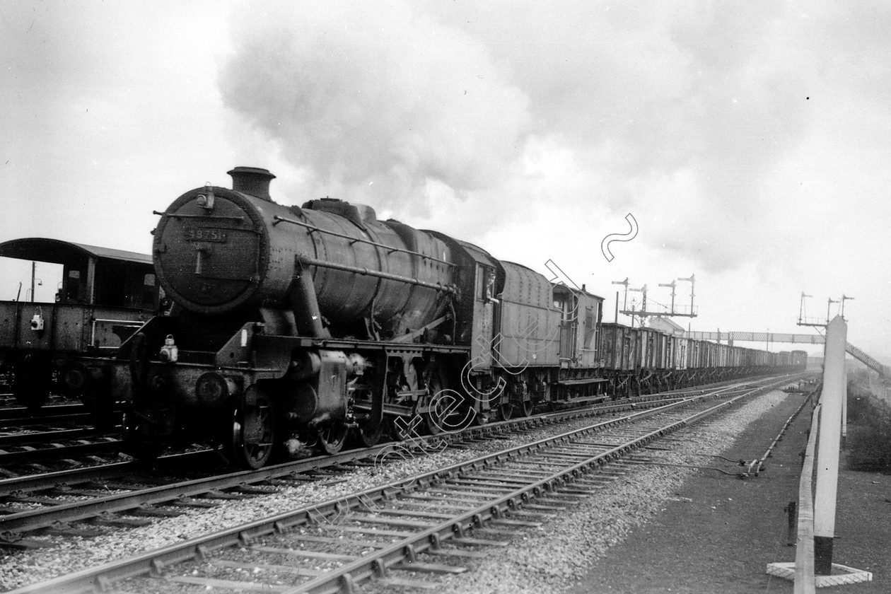 WD2079 
 ENGINE CLASS: Stanier Class 8 2-8-0 ENGINE NUMBER: 48751 LOCATION: Winwick DATE: 13 March 1963 COMMENTS: 
 Keywords: 13 March 1963, 48751, Cooperline, Stanier Class 8 2-8-0, Steam, WD Cooper, Winwick, locomotives, railway photography, trains