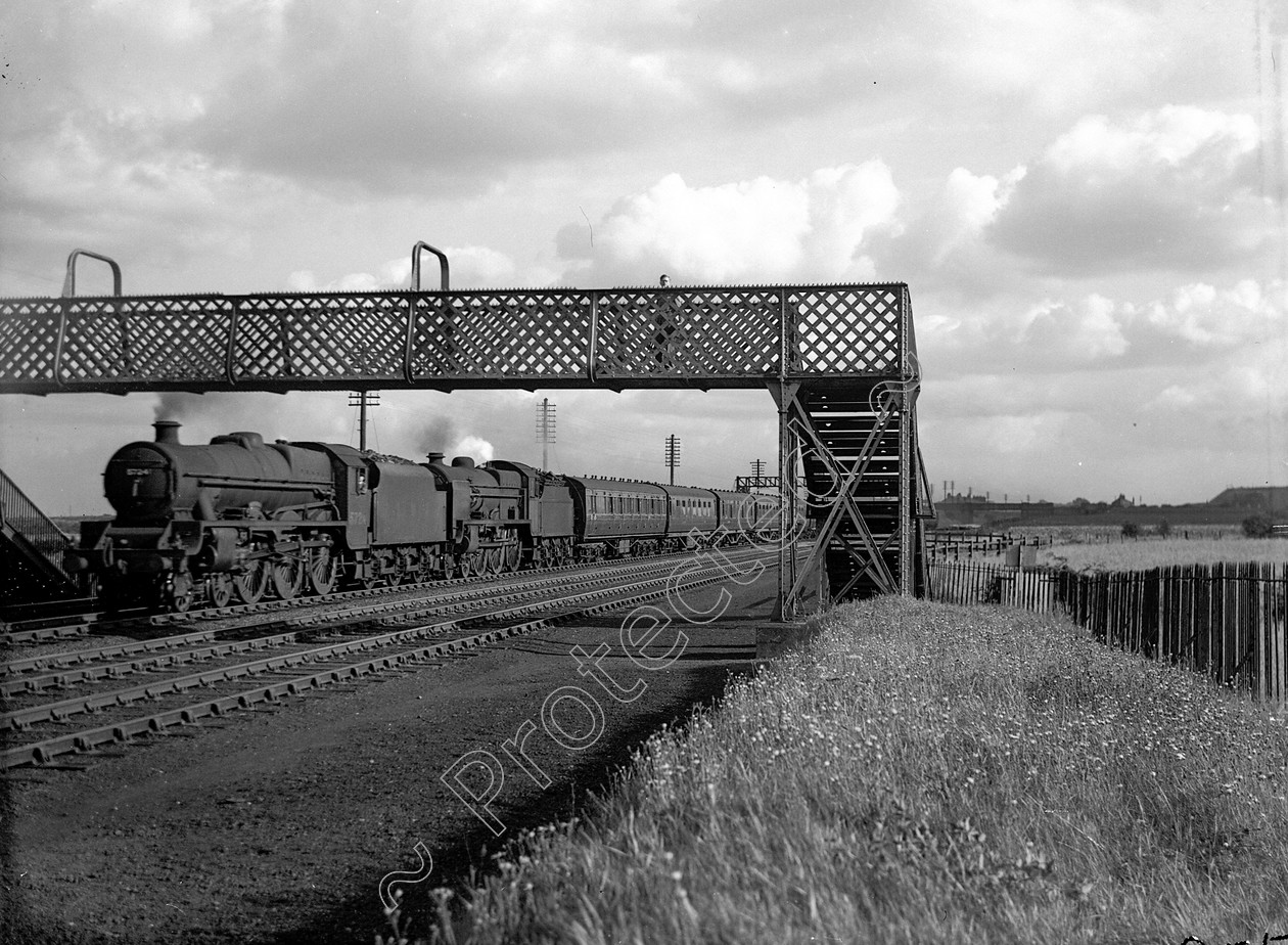 WDDH0955 
 ENGINE CLASS: Double Headed ENGINE NUMBER: 5503, 5724 LOCATION: Golborne DATE: 28 August 1946 COMMENTS: 
 Keywords: 28 August 1946, 5503, 5724, Cooperline, Double Headed, Golborne, Steam, WD Cooper, locomotives, railway photography, trains