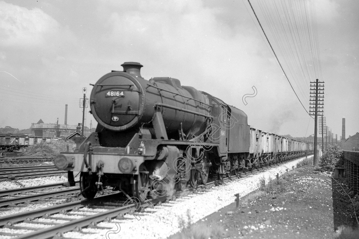 WD2018 
 ENGINE CLASS: Stanier Class 8 2-8-0 ENGINE NUMBER: 48164 LOCATION: Patricroft DATE: 00.07.1963 COMMENTS: 
 Keywords: 00.07.1963, 48164, Cooperline, Patricroft, Stanier Class 8 2-8-0, Steam, WD Cooper, locomotives, railway photography, trains