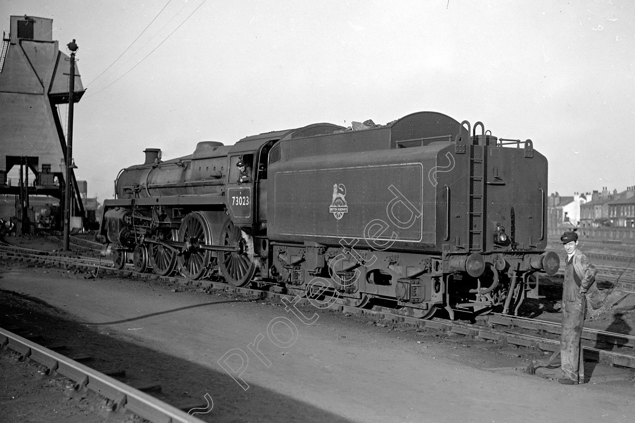 WD2407 
 ENGINE CLASS: BR 73000 4-6-0 ENGINE NUMBER: 73023 LOCATION: Patricroft DATE: 00.04.1952 COMMENTS: 
 Keywords: 00.04.1952, 73023, BR 73000 4-6-0, Cooperline, Patricroft, Steam, WD Cooper, locomotives, railway photography, trains