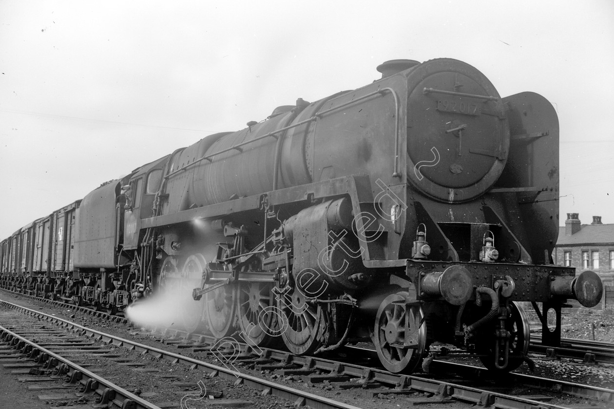 WD2615 
 ENGINE CLASS: BR Class 9 ENGINE NUMBER: 92017 LOCATION: Patricroft DATE: 05 September 1963 COMMENTS: 
 Keywords: 05 September 1963, 92017, BR Class 9, Cooperline, Patricroft, Steam, WD Cooper, locomotives, railway photography, trains