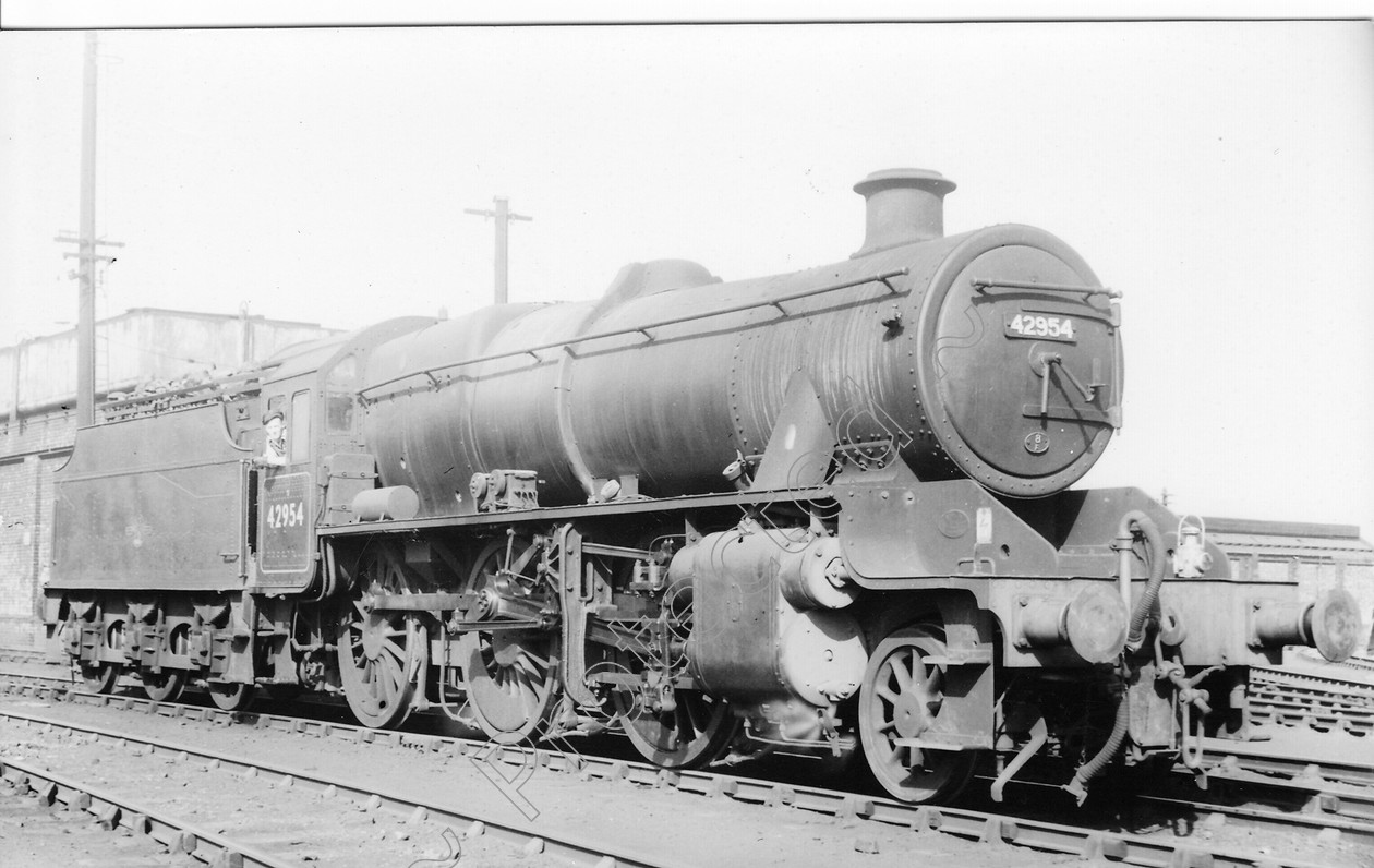 WD0673 
 ENGINE CLASS: Moguls 2-6-0 ENGINE NUMBER: 42954 LOCATION: Patricroft DATE: 11 May 1965 COMMENTS: 
 Keywords: 11 May 1965, 42954, Cooperline, Moguls 2-6-0, Patricroft, Steam, WD Cooper, locomotives, railway photography, trains