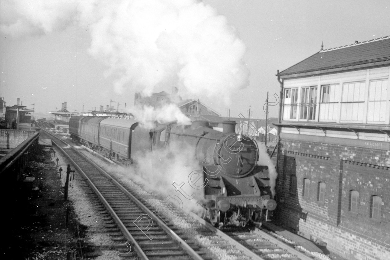 WD2447 
 ENGINE CLASS: BR 73000 4-6-0 ENGINE NUMBER: 73134 LOCATION: Patricroft DATE: 22 November 1963 COMMENTS: 
 Keywords: 22 November 1963, 73134, BR 73000 4-6-0, Cooperline, Patricroft, Steam, WD Cooper, locomotives, railway photography, trains