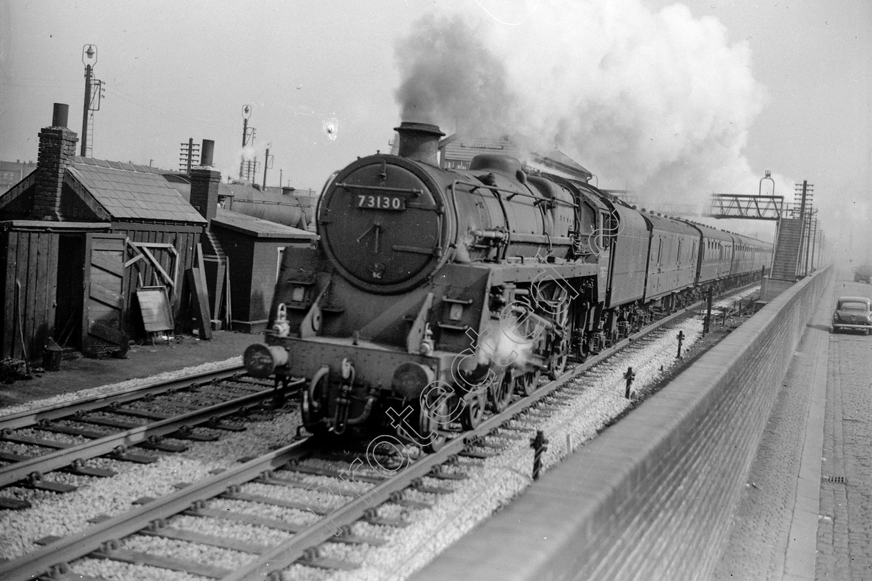 WD2439 
 ENGINE CLASS: BR 73000 4-6-0 ENGINE NUMBER: 73130 LOCATION: Patricroft DATE: 21 March 1964 COMMENTS: 
 Keywords: 21 March 1964, 73130, BR 73000 4-6-0, Cooperline, Patricroft, Steam, WD Cooper, locomotives, railway photography, trains