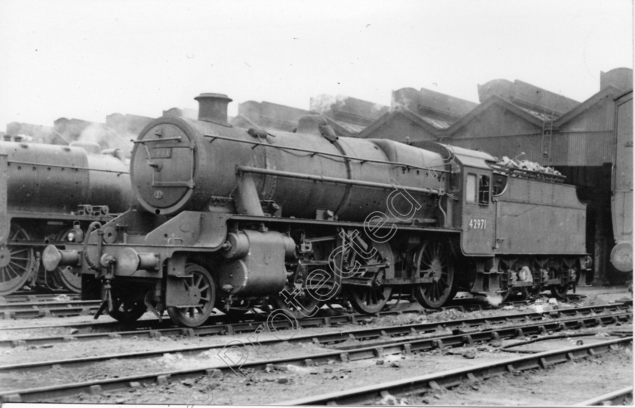 WD0680 
 ENGINE CLASS: Moguls 2-6-0 ENGINE NUMBER: 42971 LOCATION: Edgehill DATE: 02 July 1951 COMMENTS: 
 Keywords: 02 July 1951, 42971, Cooperline, Edgehill, Moguls 2-6-0, Steam, WD Cooper, locomotives, railway photography, trains