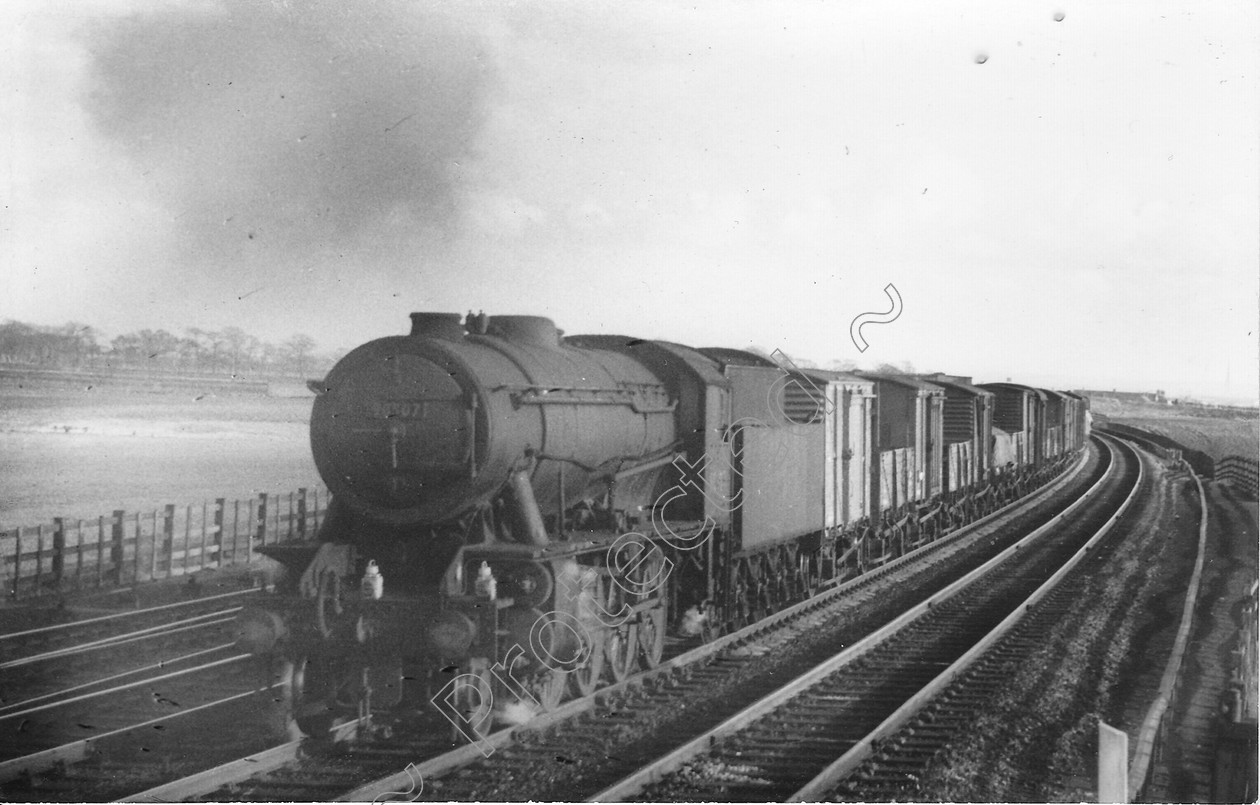 WD2526 
 ENGINE CLASS: Riddles 2-8-0 90000 ENGINE NUMBER: 90507 LOCATION: Winwick DATE: 15 March 1963 COMMENTS: 
 Keywords: 15 March 1963, 90507, Cooperline, Riddles 2-8-0 90000, Steam, WD Cooper, Winwick, locomotives, railway photography, trains