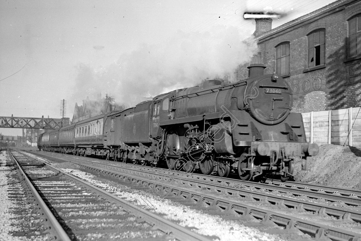 WD2417 
 ENGINE CLASS: BR 73000 4-6-0 ENGINE NUMBER: 73040 LOCATION: Eccles Junction DATE: COMMENTS: 
 Keywords: 73040, BR 73000 4-6-0, Cooperline, Eccles Junction, Steam, WD Cooper, locomotives, railway photography, trains