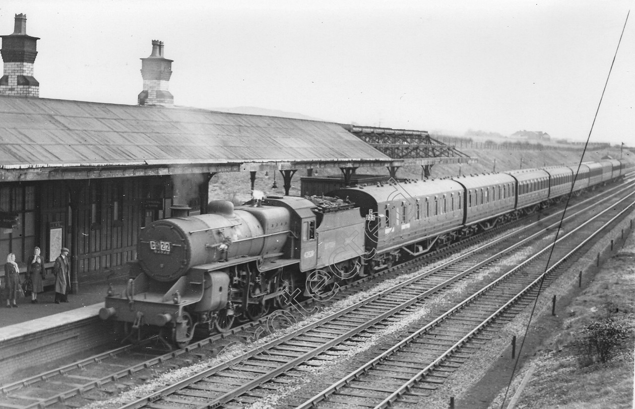 WD0642 
 ENGINE CLASS: Moguls 2-6-0 ENGINE NUMBER: 42820 LOCATION: Daisy Hill DATE: 00.04.1952 COMMENTS: 
 Keywords: 00.04.1952, 42820, Cooperline, Daisy Hill, Moguls 2-6-0, Steam, WD Cooper, locomotives, railway photography, trains