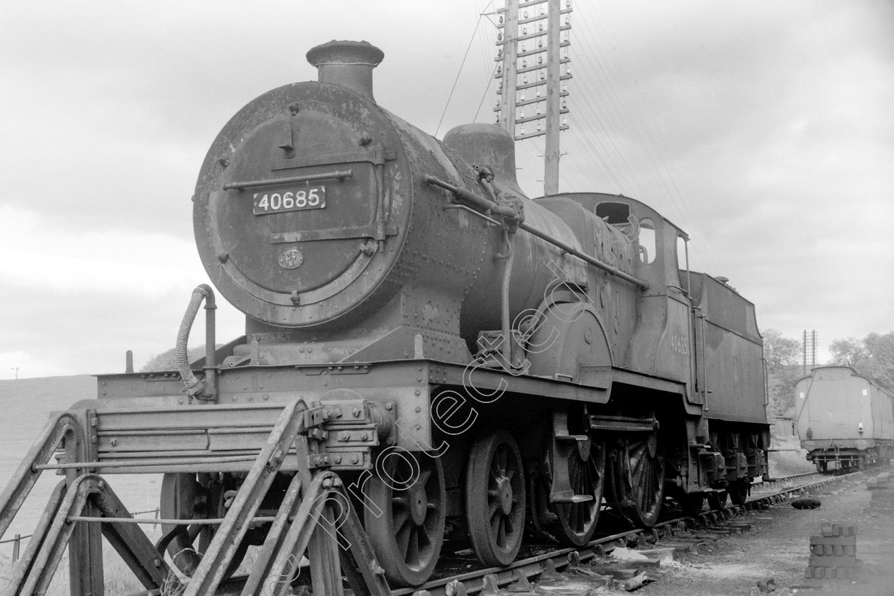 WD0551 
 ENGINE CLASS: Class 2 4-4-0 ENGINE NUMBER: 40685 LOCATION: Hellifield DATE: 12 May 1961 COMMENTS: 
 Keywords: 12 May 1961, 40685, Class 2 4-4-0, Cooperline, Hellifield, Steam, WD Cooper, locomotives, railway photography, trains