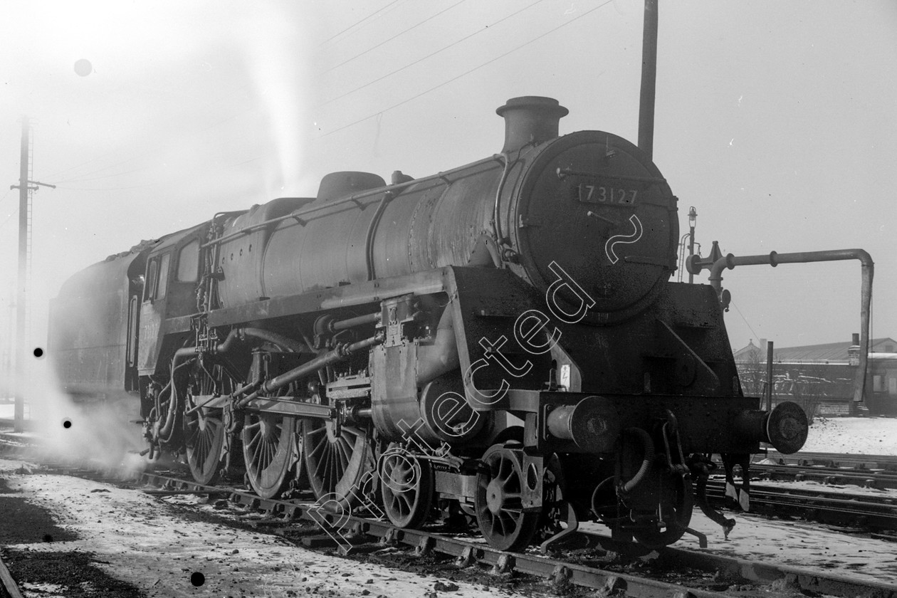 WD2433 
 ENGINE CLASS: BR 73000 4-6-0 ENGINE NUMBER: 73127 LOCATION: Patricroft DATE: 27 December 1962 COMMENTS: 
 Keywords: 27 December 1962, 73127, BR 73000 4-6-0, Cooperline, Patricroft, Steam, WD Cooper, locomotives, railway photography, trains