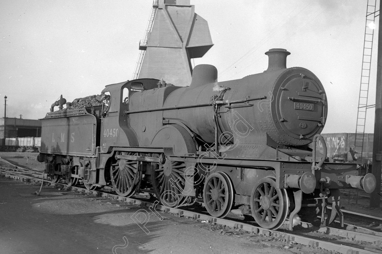 WD0562 
 ENGINE CLASS: Class 2 4-4-0 ENGINE NUMBER: 40450 LOCATION: Patricroft DATE: 20 May 1951 COMMENTS: 
 Keywords: 20 May 1951, 40450, Class 2 4-4-0, Cooperline, Patricroft, Steam, WD Cooper, locomotives, railway photography, trains