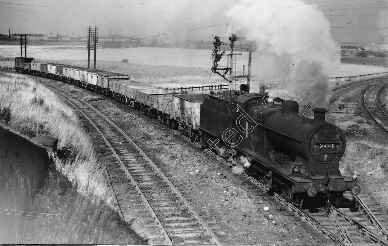 WD0747 
 ENGINE CLASS: Class 4 0-6-0 ENGINE NUMBER: 44301 LOCATION: Wigan DATE: 27 September 1962 COMMENTS: 
 Keywords: 27 September 1962, 44301, Class 4 0-6-0, Cooperline, Steam, WD Cooper, Wigan, locomotives, railway photography, trains